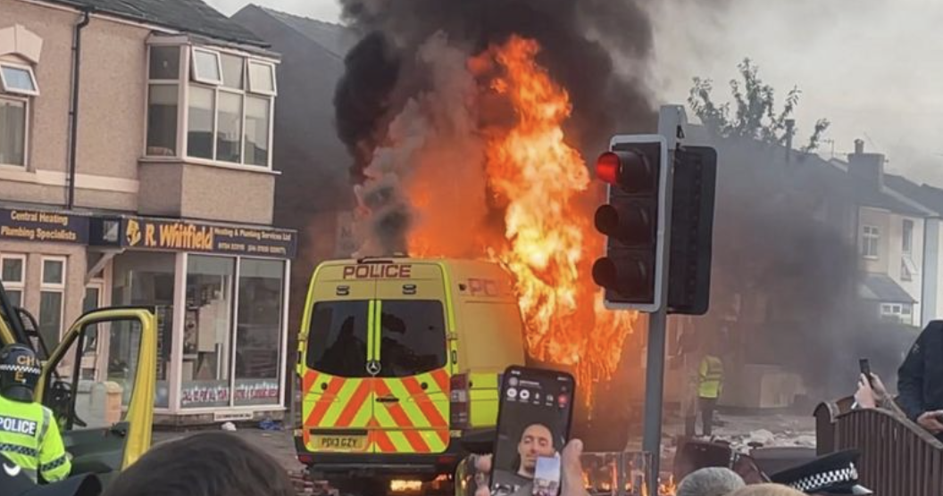 Police van set alight in Southport clashes